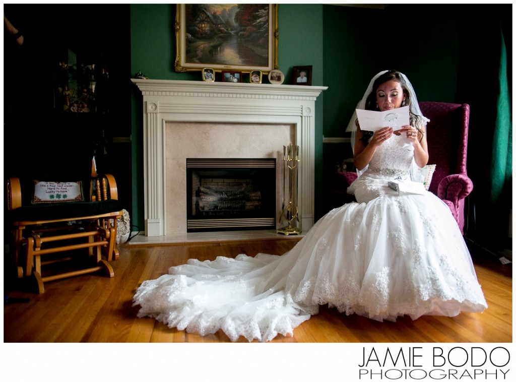 Bride reads emotional letter from groom before wedding ceremony photo